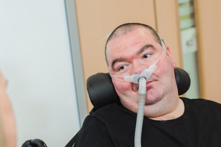 Person with MND with ventilator