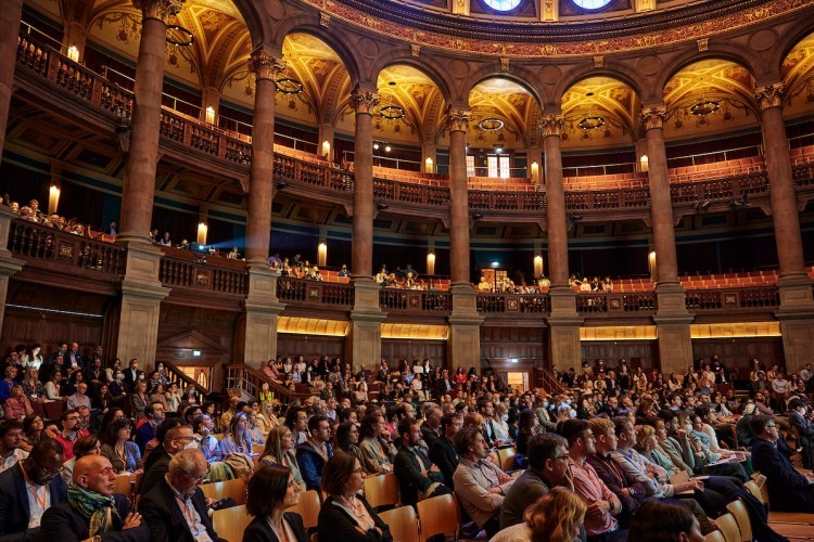 Picture of attendees at the ENCALS conference inside McEwan Hall in Edinburgh