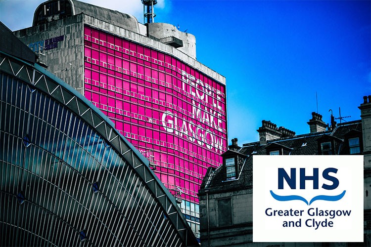 Image of building in Glasgow with 'people make Glasgow' sign with an NHS Greater Glasgow and Clyde logo over the top